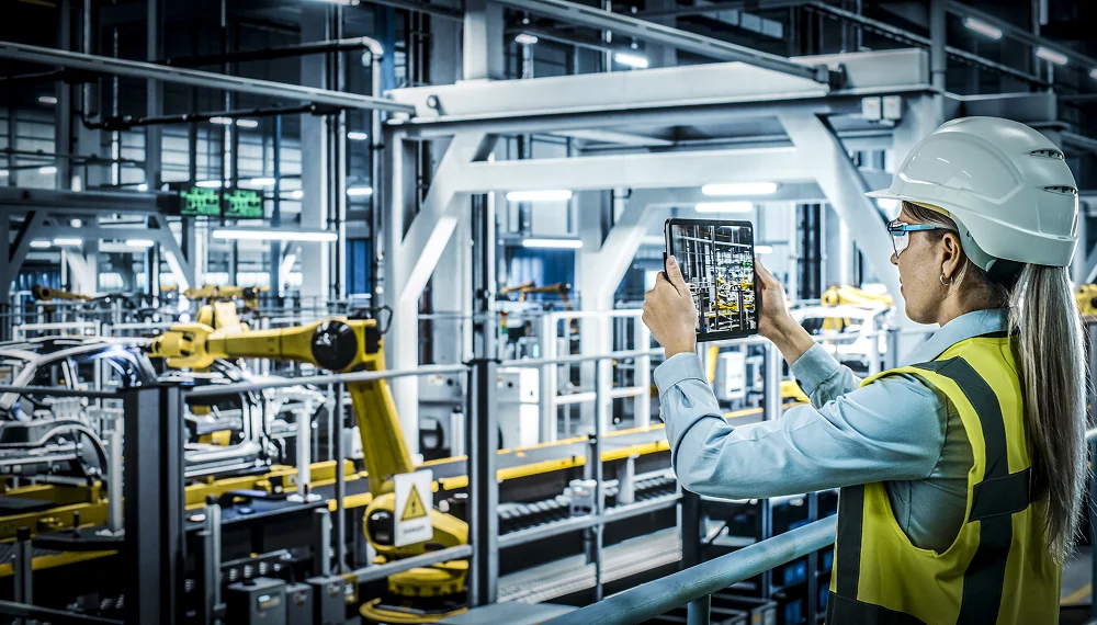 Car Factory Female Automotive Engineer Using Augmented Reality 