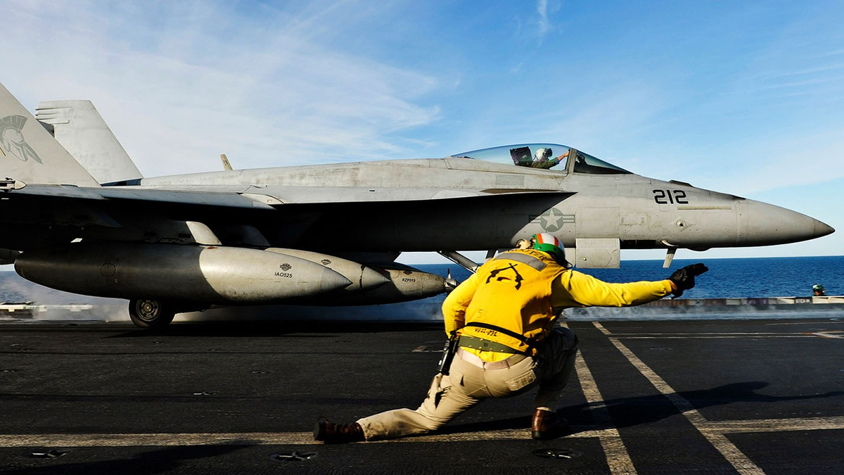 Airforce super hornet plane and aircraft mechanic