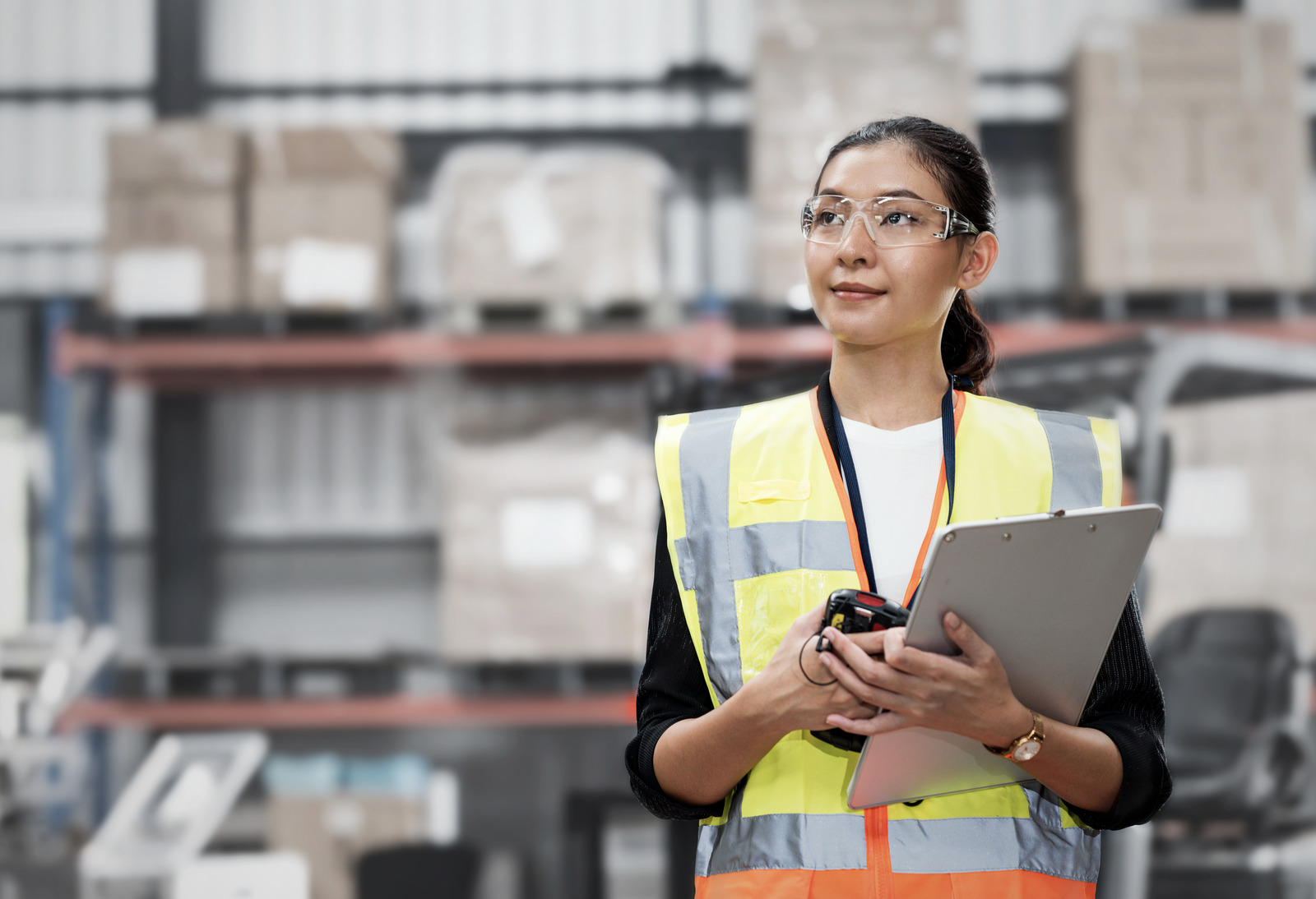 Portrait of Female Warehouse Supervisor working in leading distribution warehouse