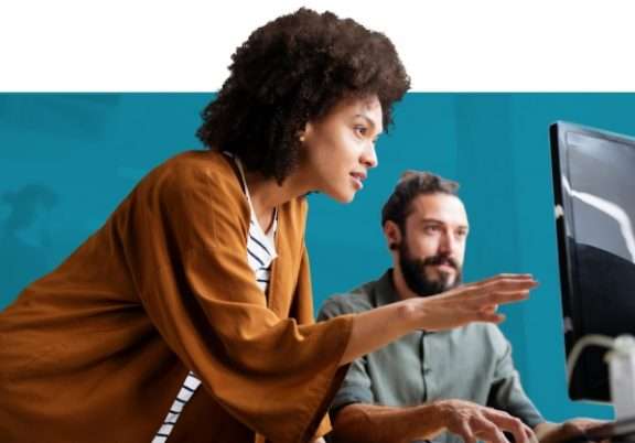 woman looking at a desktop