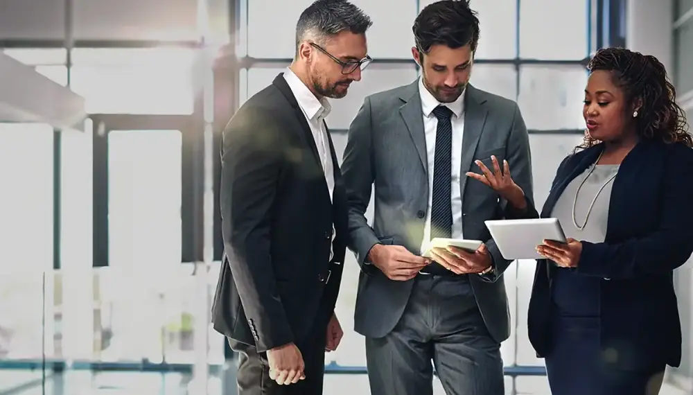 Business people talking with a tablet