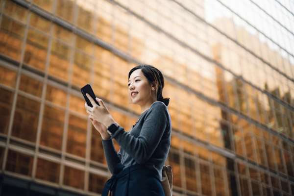 Woman using property management software on a tablet 