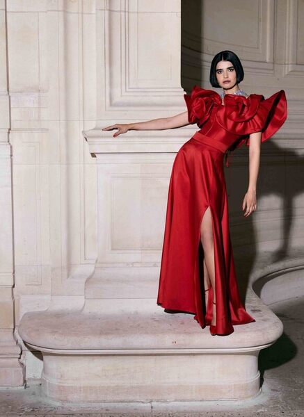 anne fontaine model red gown stairs pillar