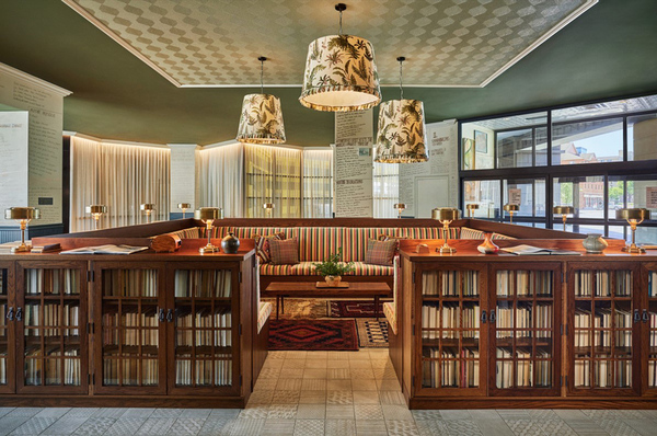 hotel lobby bookshelves couches