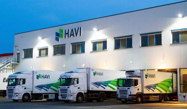 HAVI distribution center building with 3 trucks