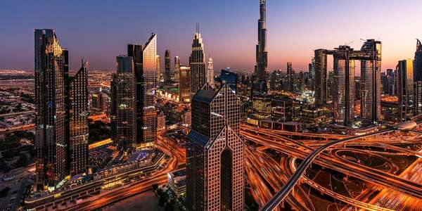 1089728672 City skyline in   Dubai traffic junction and Burj Khalifa Saudi Arabia EMEA 