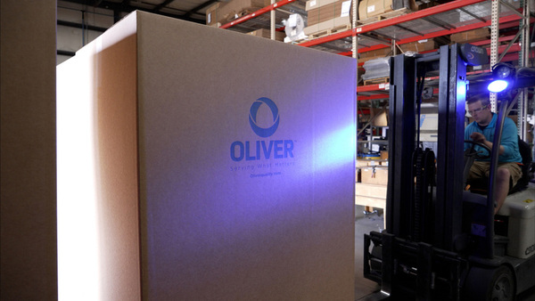 Oliver shipping box on forklift in factory