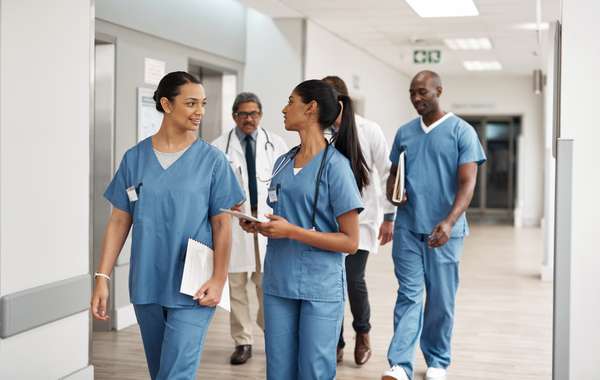 1421919793_group-of-nurses-doctor-walking-in-hospital_DayinLife_Healthcare_Getty