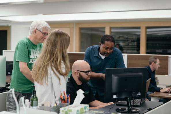 People looking at computer screen