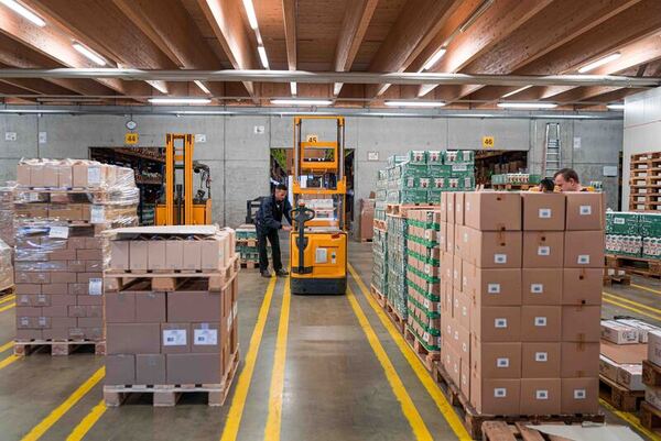 man forklift food warehouse boxes