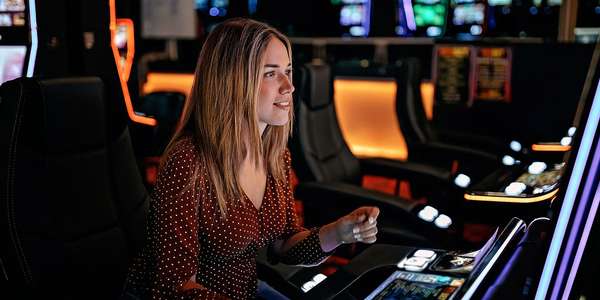Hospitality gaming casino slots   woman  