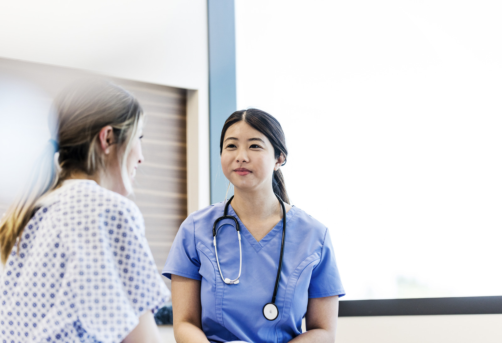 Nurse-smiles-proudly-patient_Getty