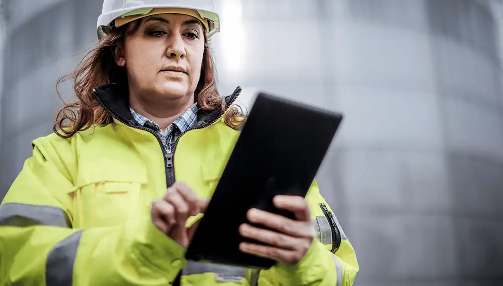 Manager using utilities software on a tablet