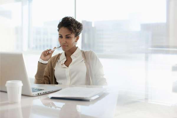 Businesswoman accessing Infor Marketplace on a desktop