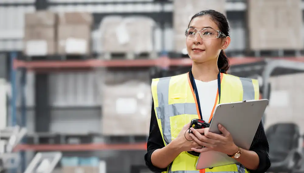 Warehouse supervisor doing inventory 