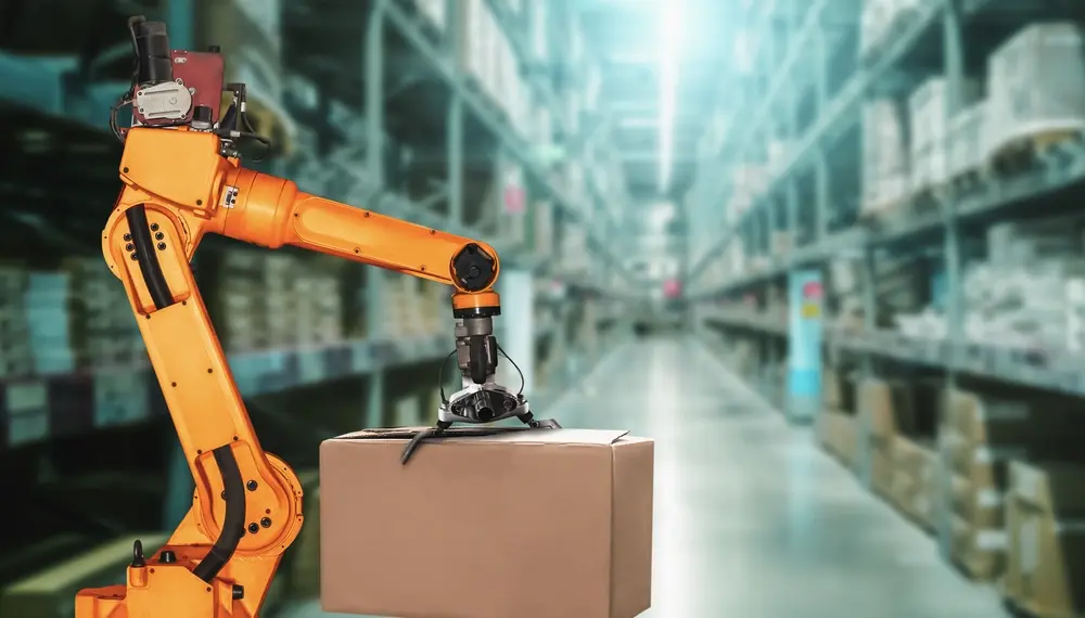 Robotic arm holding a box