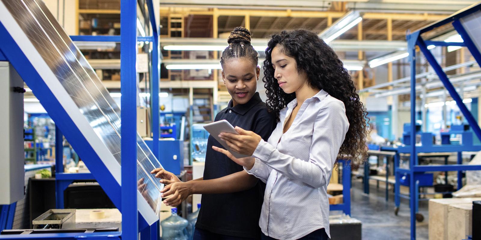 supervisor worker discussing work digital tablet