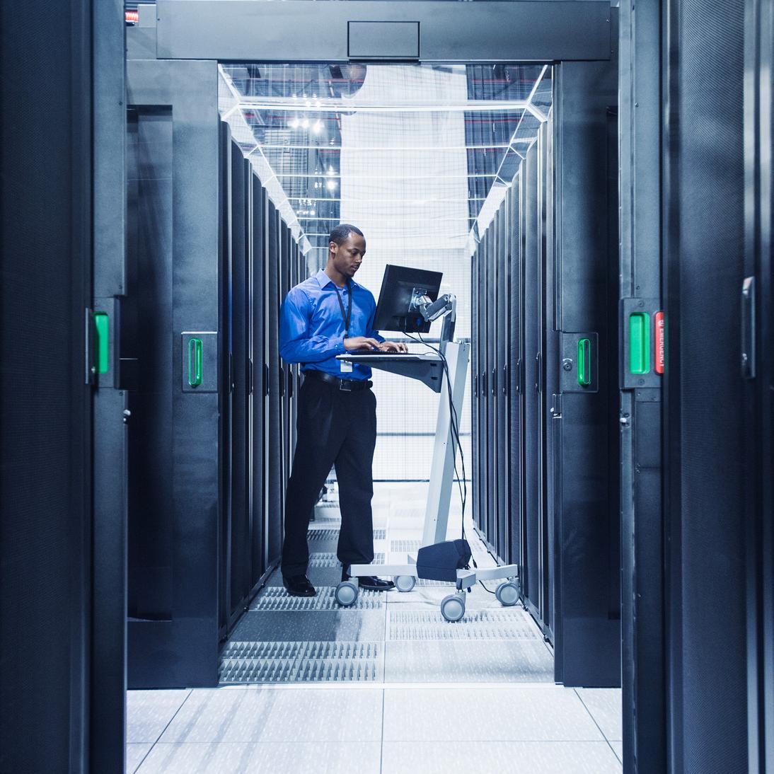 Cloud server room AfricanAmerican man
  data