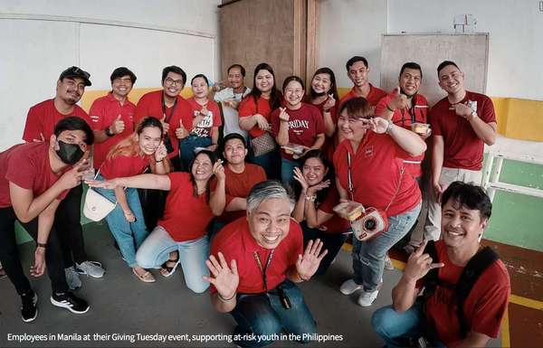 group of volunteers smiling for the camera 