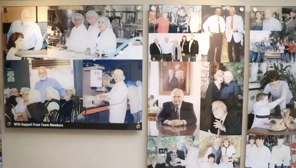 Wall of photos at Ruiz Foods factory