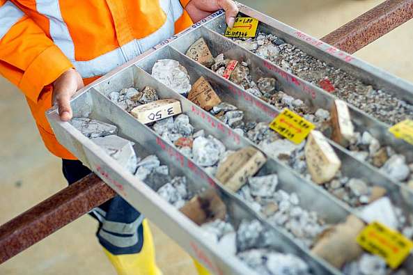 Worker showing samples