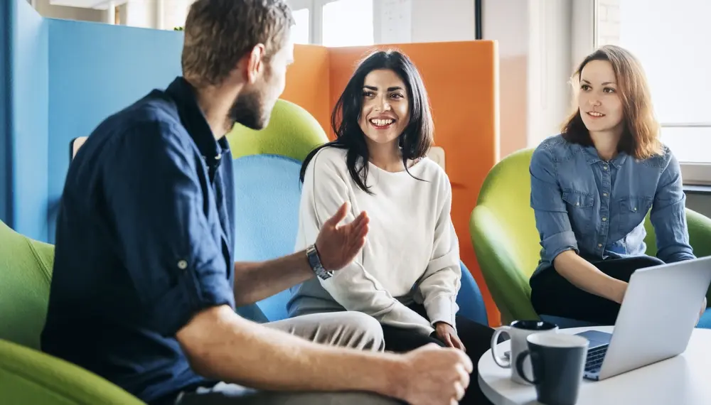 Colleagues meeting about AI agents