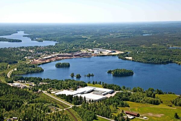 aerial view of buildings forests and lakes