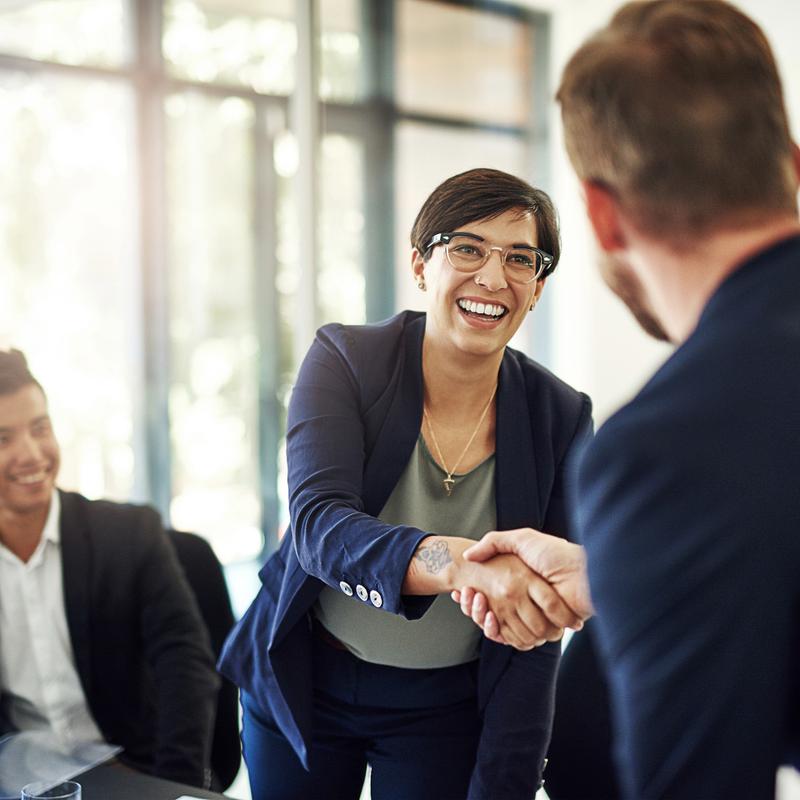 businesspeople meeting boardroom handshake
  woman