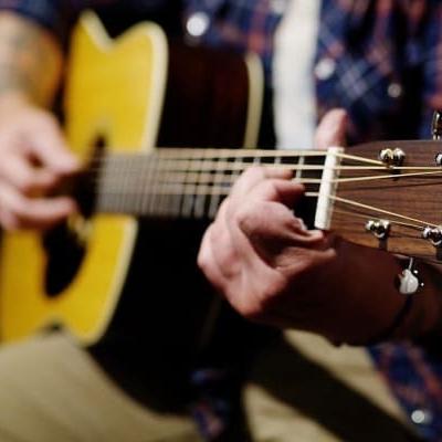 man-playing-guitar