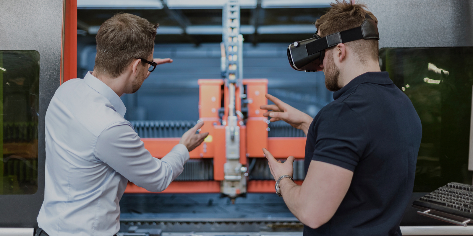 961105980 man explaining machine to colleague wearing vr Getty 20PB