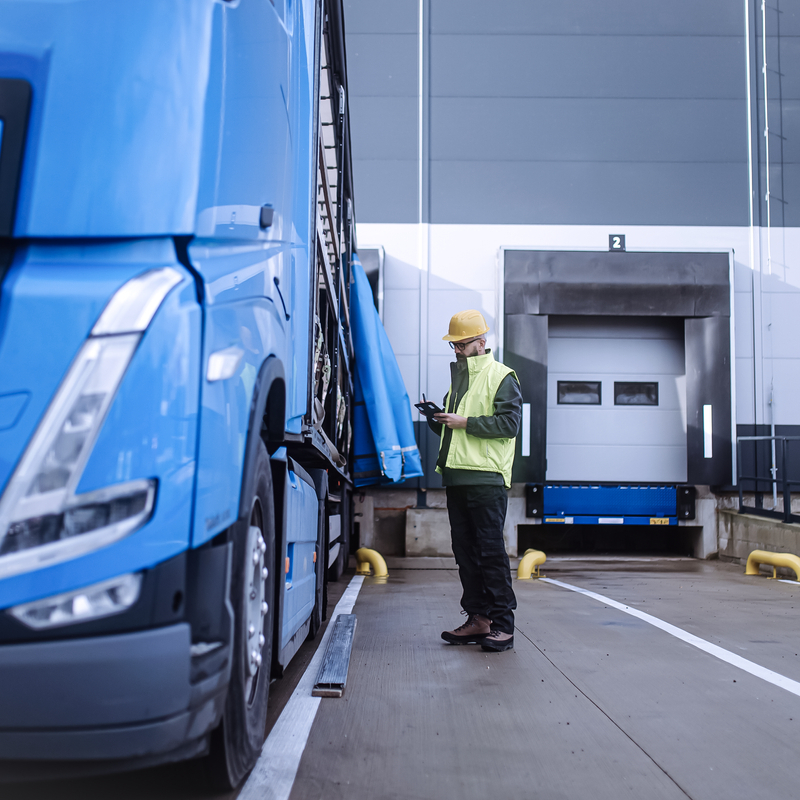 Warehouse receiver standing by truck