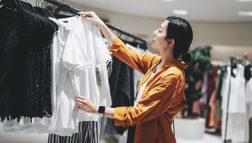 Woman shopping in clothing store