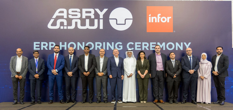 men and women line up onstage with ASRY Infor logos