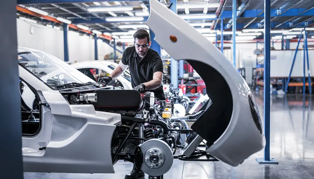 664659279-Engineer building car in racing car factory-Getty_Edited.tif