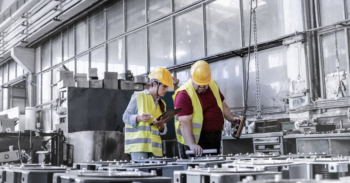 Engineers working in metal manufacturing industry