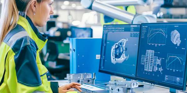 woman-on-CAD-machine-assembly-mechanical-engineer-DayInLife_AdobeStock